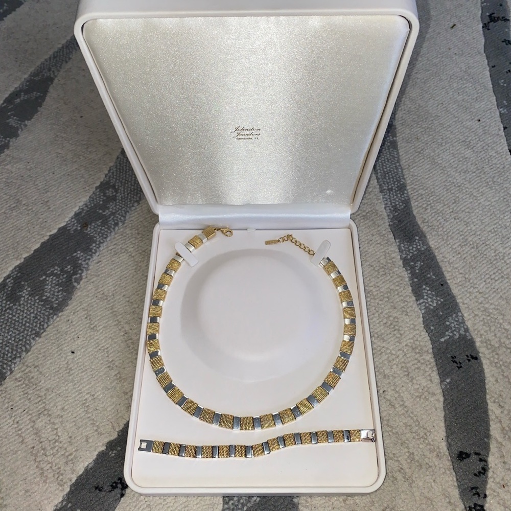 Napier gold and silver two toned necklace and bracelet set.